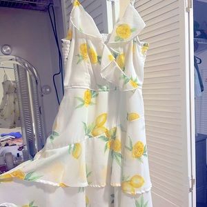 Summery, lemon spaghetti strap dress. Super cute. Like new!